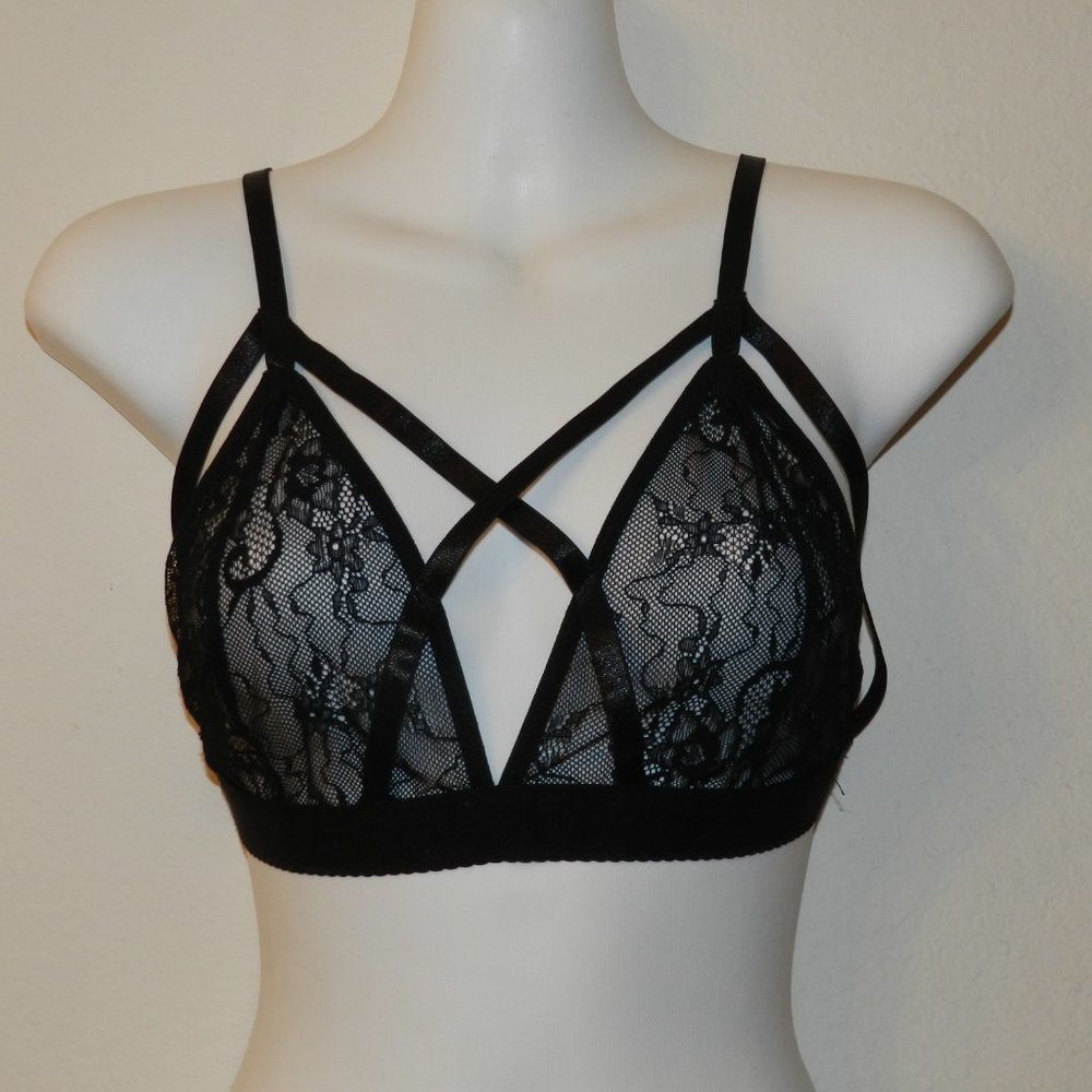Black lace soft cup, strappy cage front bra with elastic band, adjustable straps